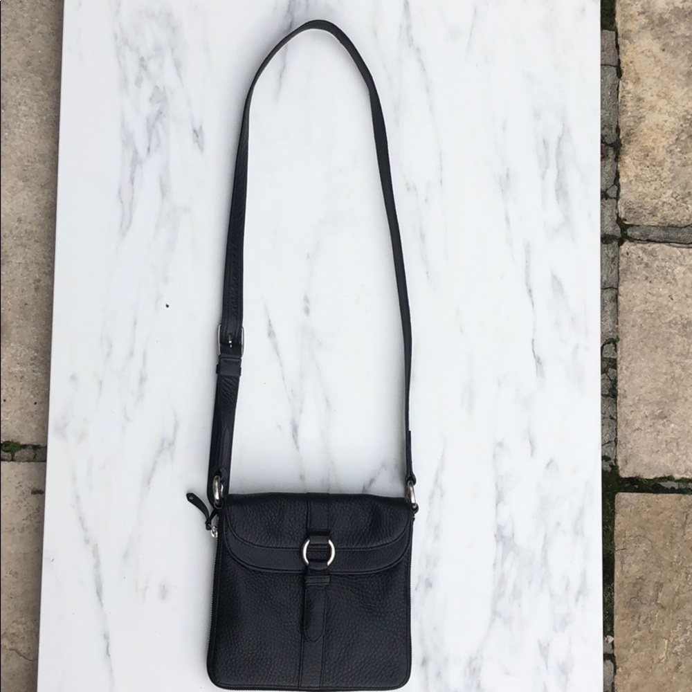 Brand new. Never used. Cole Hann cross body purse